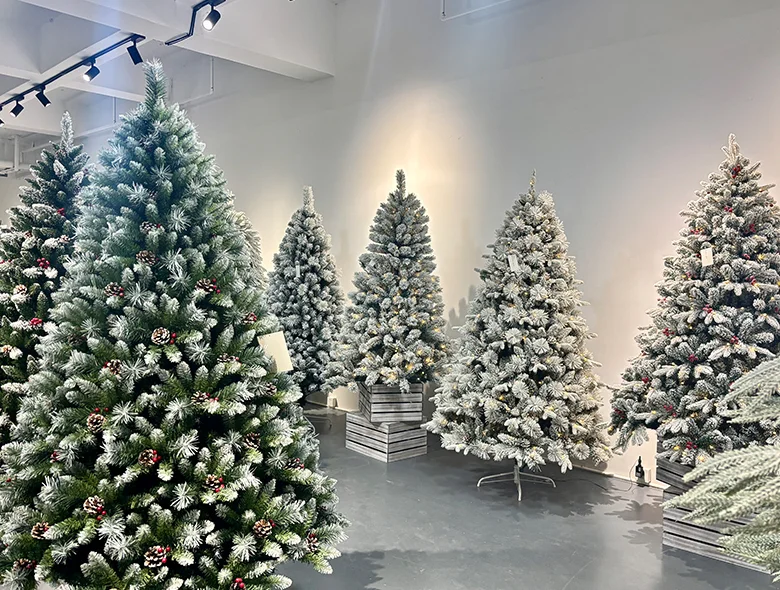 Snow Flocked Artificial Christmas Trees Display